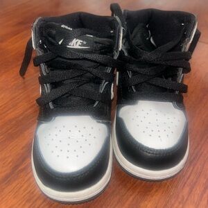 Nike Kids Black and White High-Top Sneakers with Lace-Up Closure